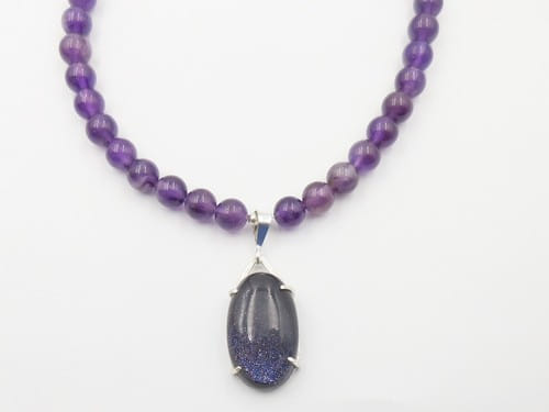 DKC-1080 Necklace Amethyst beads and Goldstone pendant $225 at Hunter Wolff Gallery